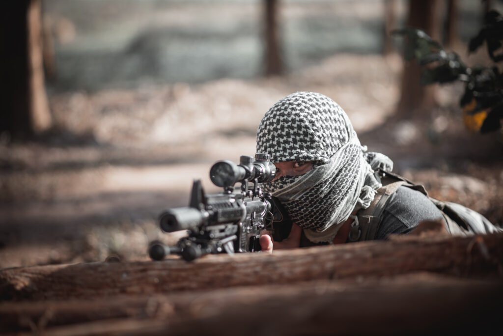 Man terrorist wearing a mask and holding a gun, Terrorist concpe